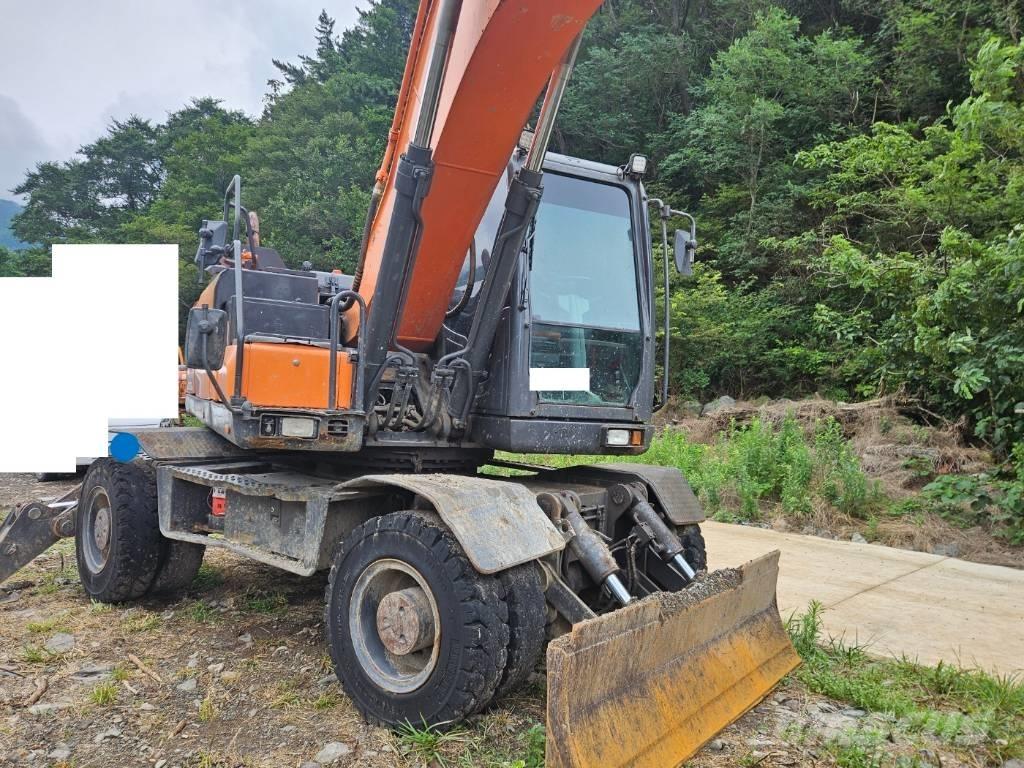 Doosan DX 210 W Колёсные экскаваторы