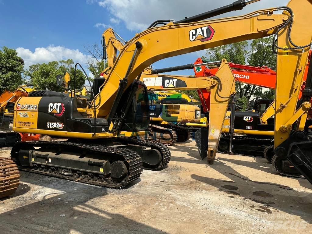 CAT 313 Малые экскаваторы 7т-12т