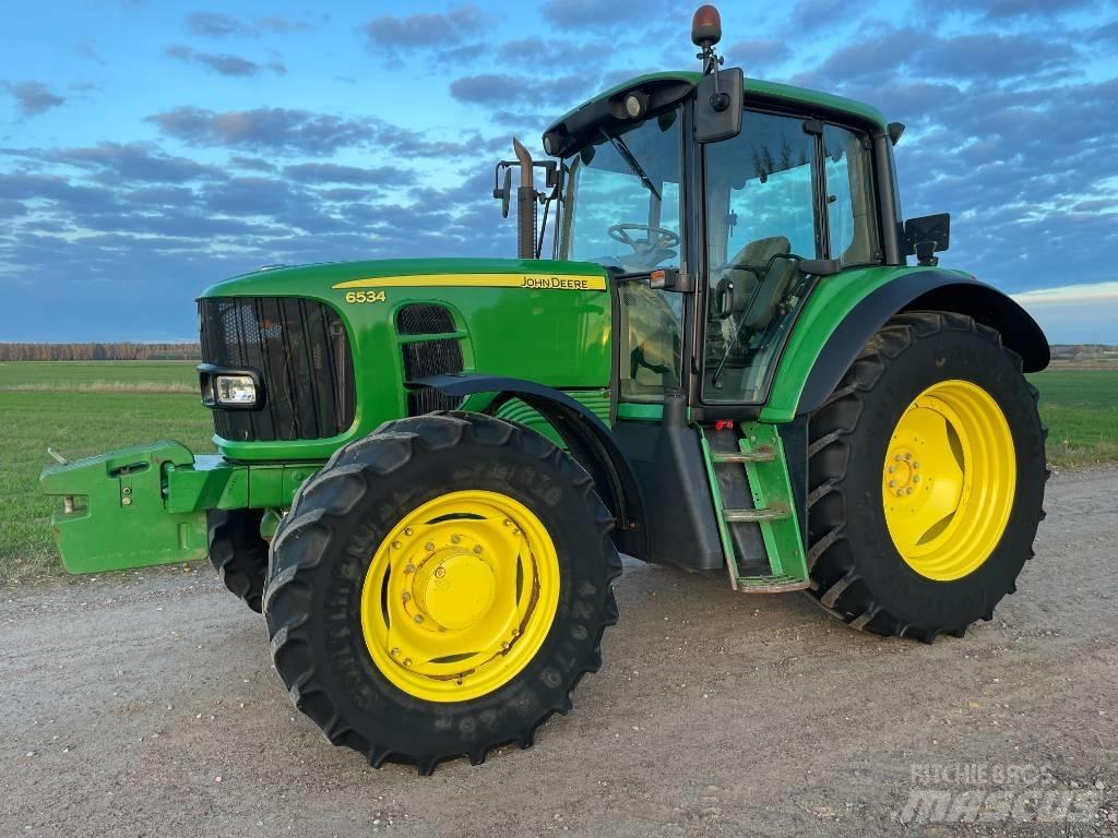 John Deere 6534 Трактора