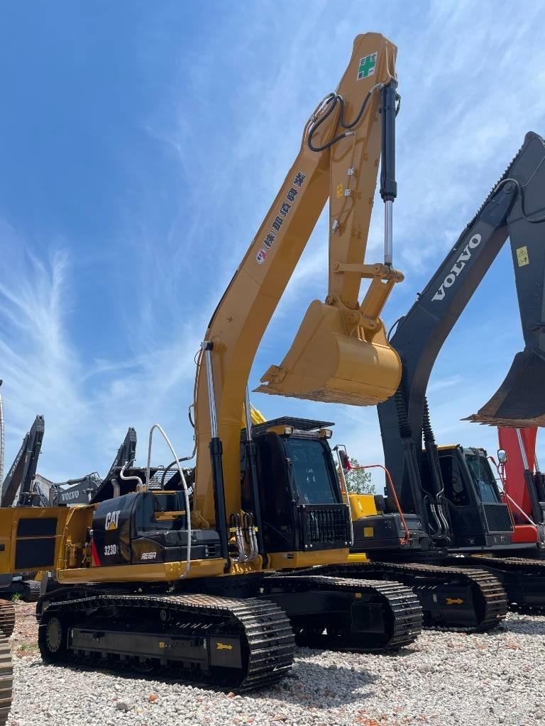 CAT 323 Гусеничные экскаваторы