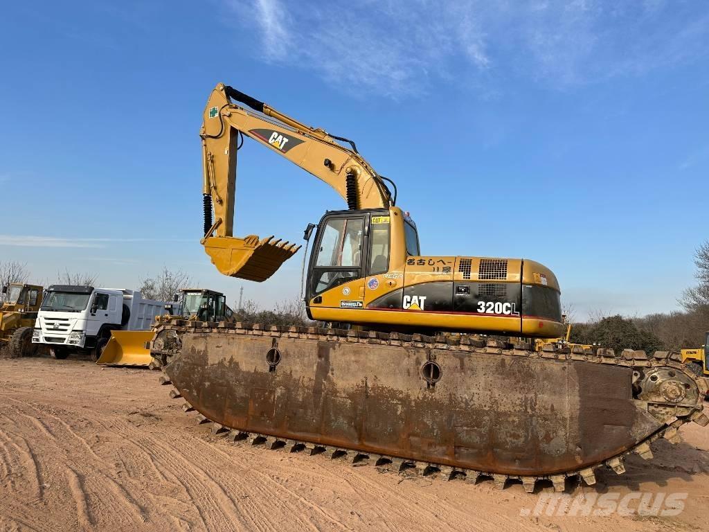CAT 320 C L Экскаваторы-амфибии