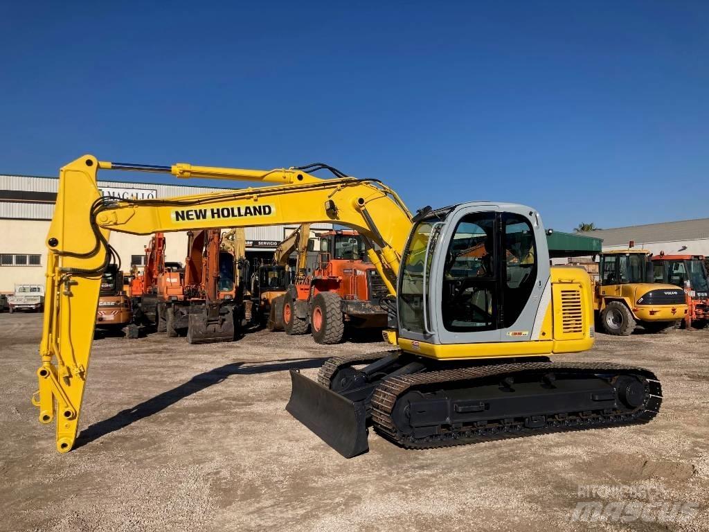 New Holland E 135 SR Малые экскаваторы 7т-12т