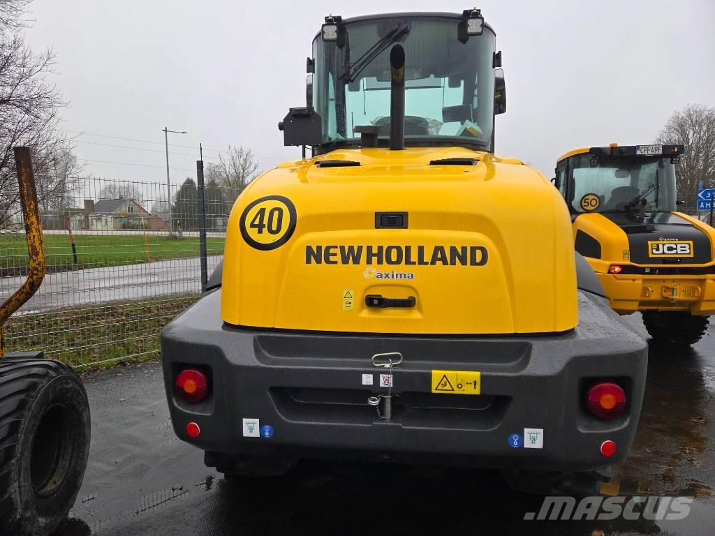 New Holland W100D Фронтальные погрузчики