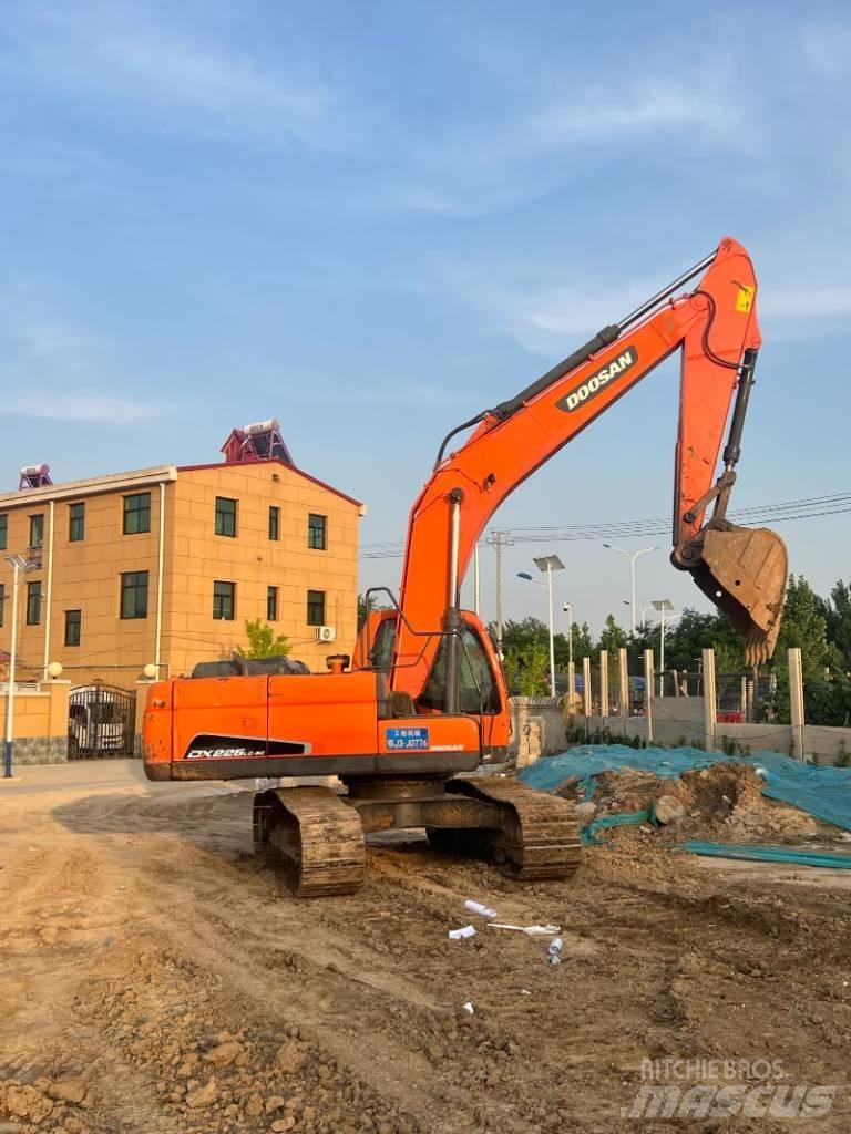 Doosan DX225LC-9C Гусеничные экскаваторы