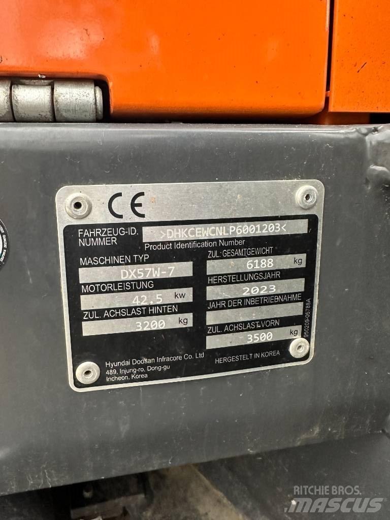 Develon DX 57 W-7 Колёсные экскаваторы