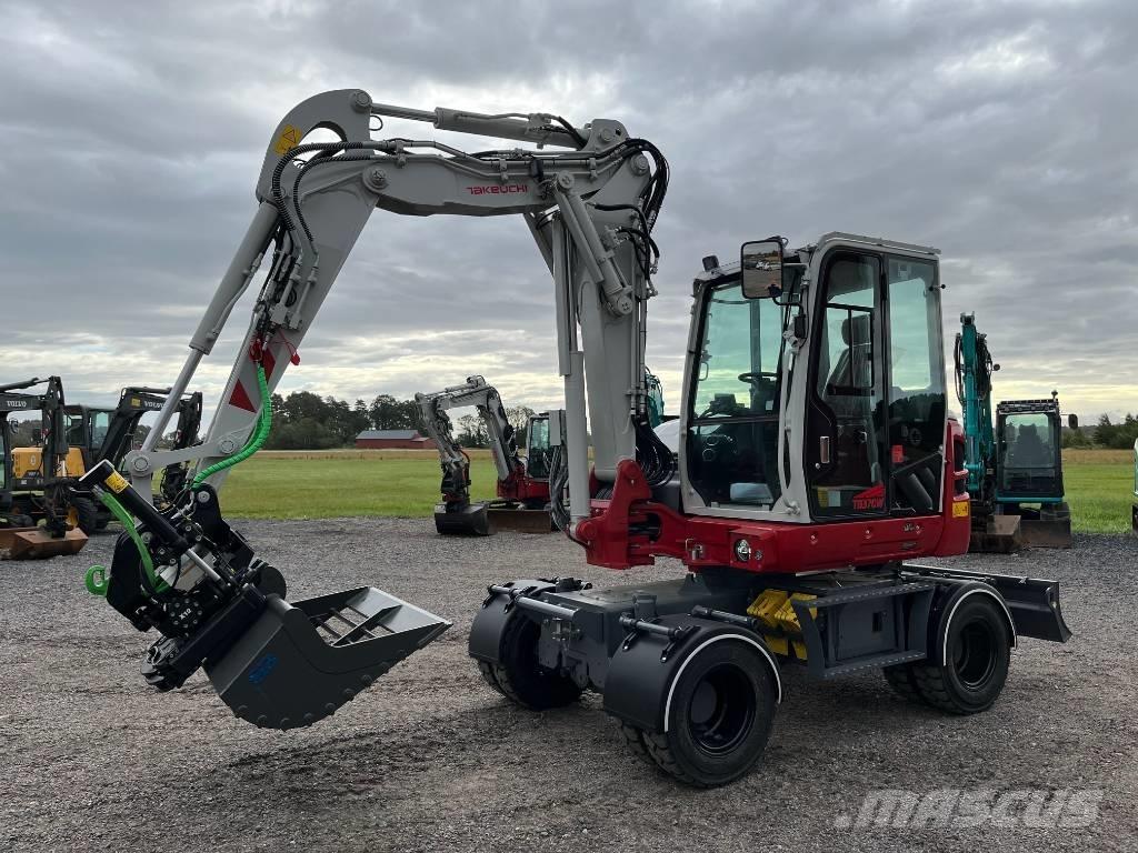 Takeuchi TB 370 W Колёсные экскаваторы