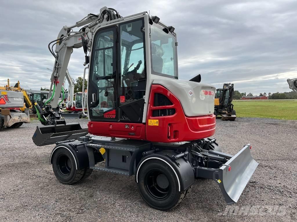 Takeuchi TB 370 W Колёсные экскаваторы