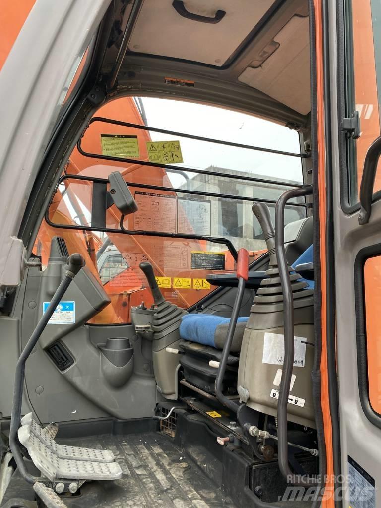 Hitachi 135 Гусеничные экскаваторы