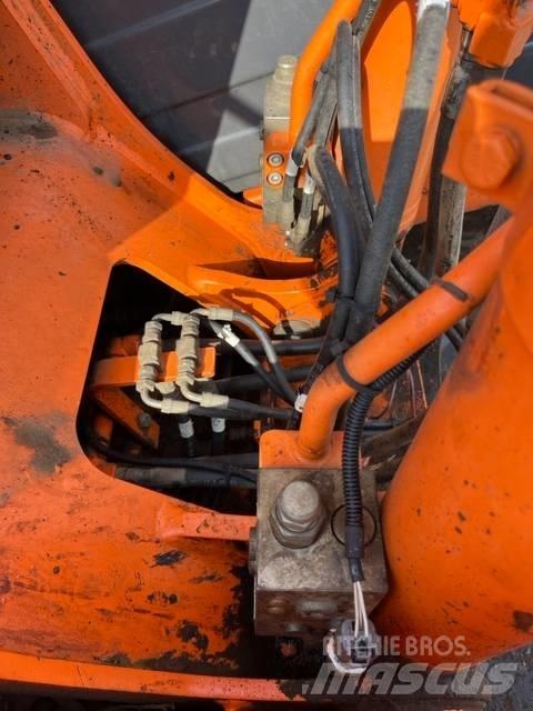 Doosan DX 140 LC Гусеничные экскаваторы