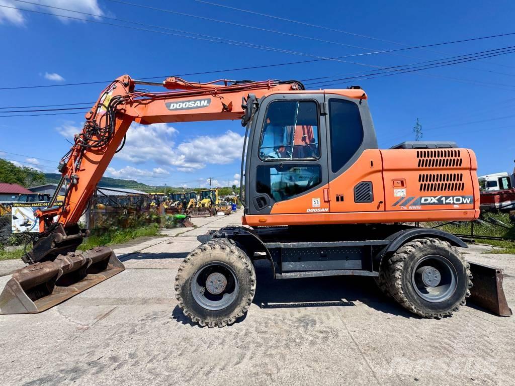 Doosan DX 140 W-3 Колёсные экскаваторы