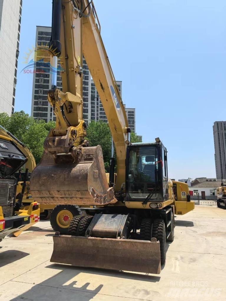 CAT M 315 D2 Колёсные экскаваторы