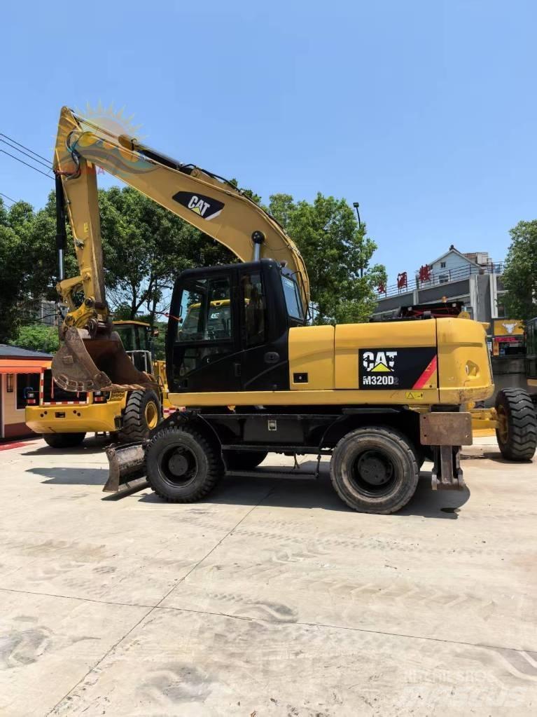 CAT M 315 D2 Колёсные экскаваторы