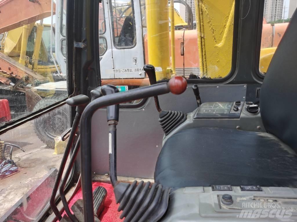 Komatsu PC60-7 Гусеничные экскаваторы