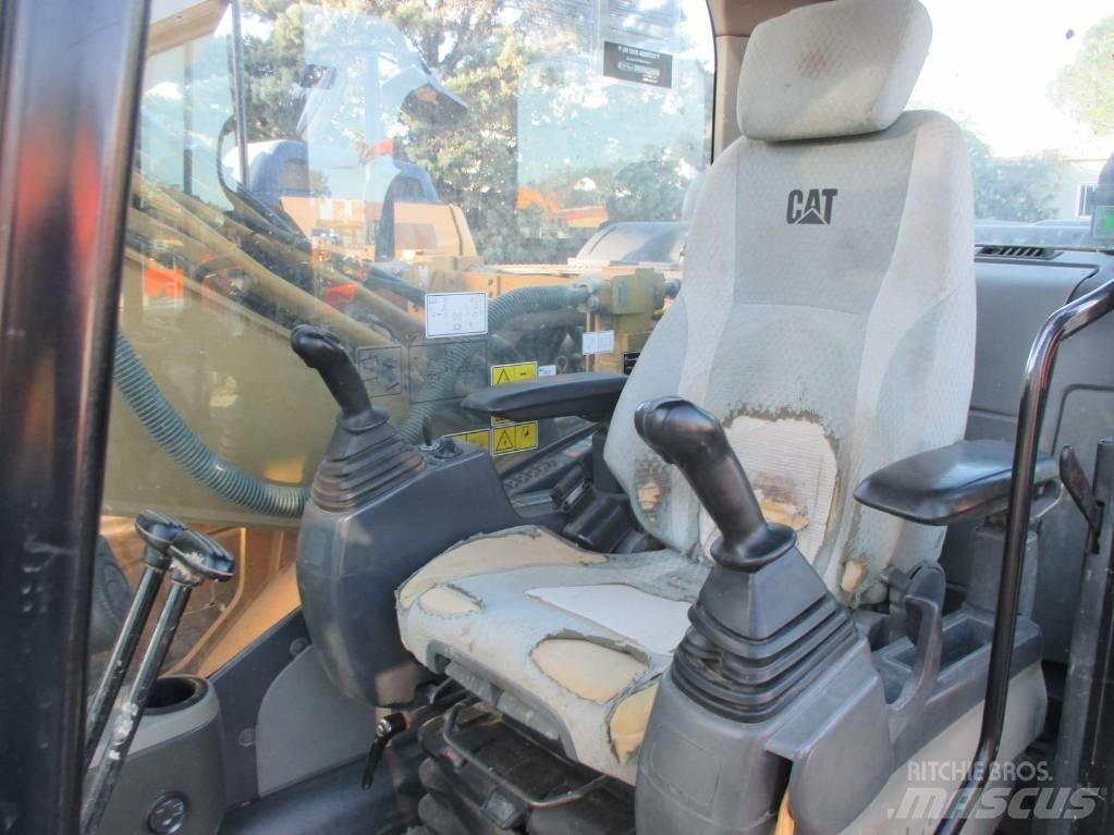 CAT 323 D L Гусеничные экскаваторы