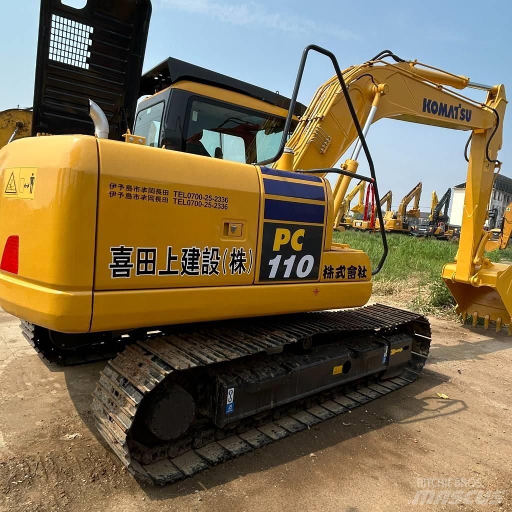 Komatsu 110 Гусеничные экскаваторы