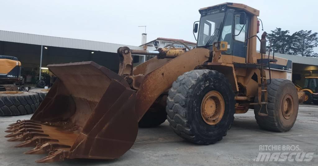 Komatsu WA500-1 Фронтальные погрузчики