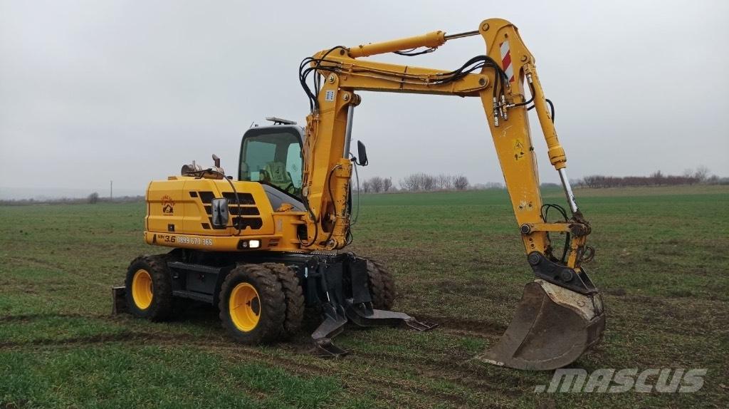 New Holland MH 3.6 Колёсные экскаваторы