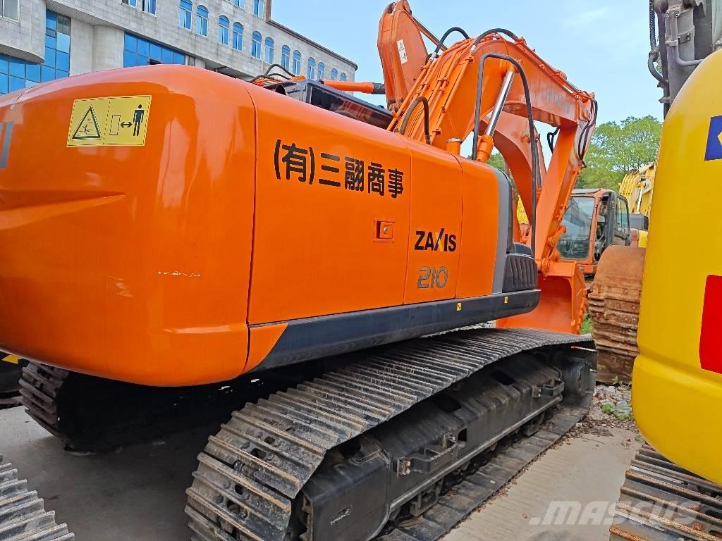 Hitachi ZX 210 Гусеничные экскаваторы