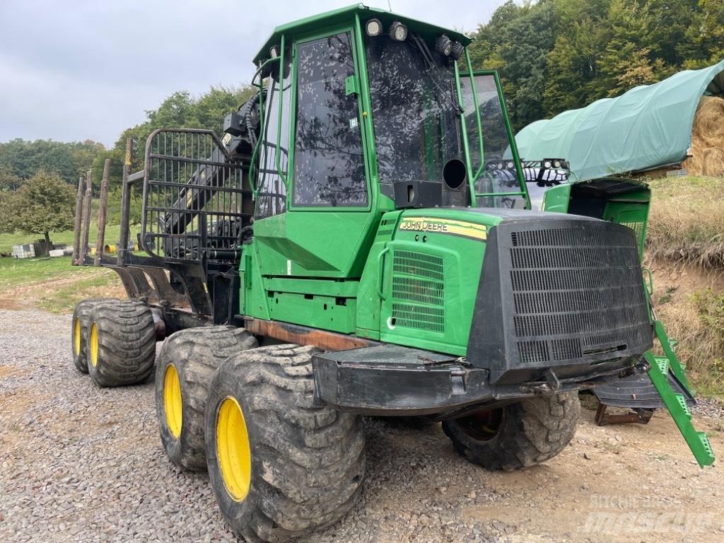 John Deere 1010 E Форвардеры