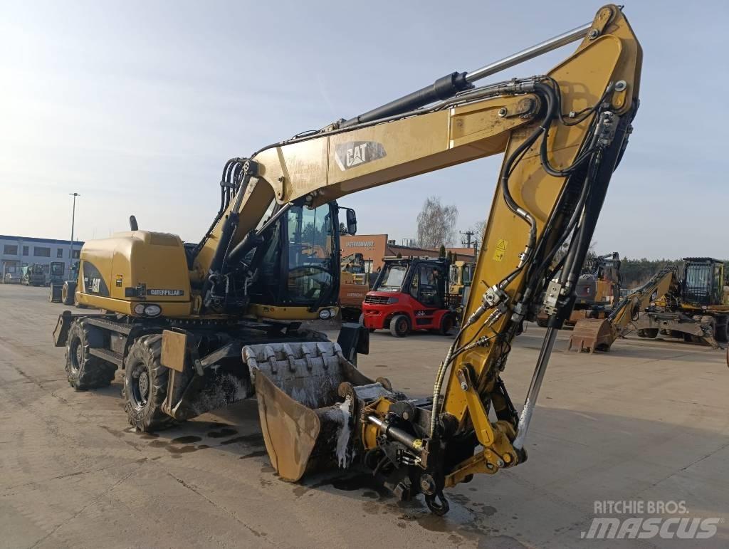 CAT M 313 D Колёсные экскаваторы