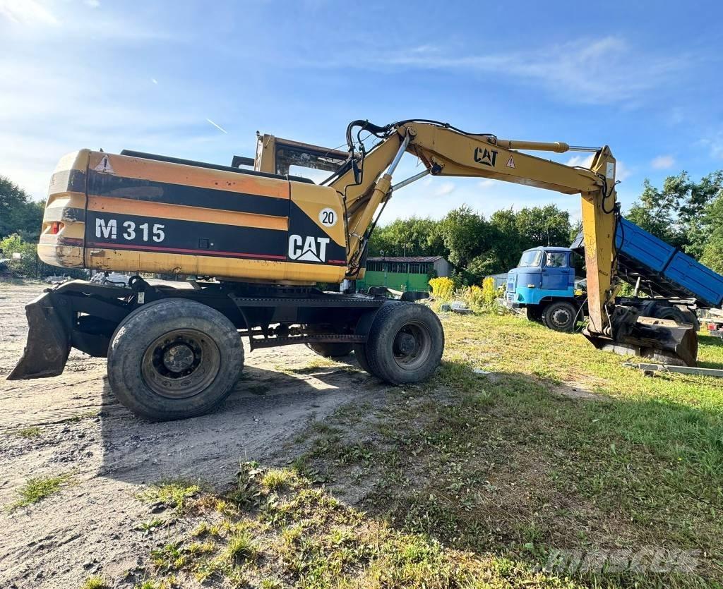 CAT M 315 Колёсные экскаваторы