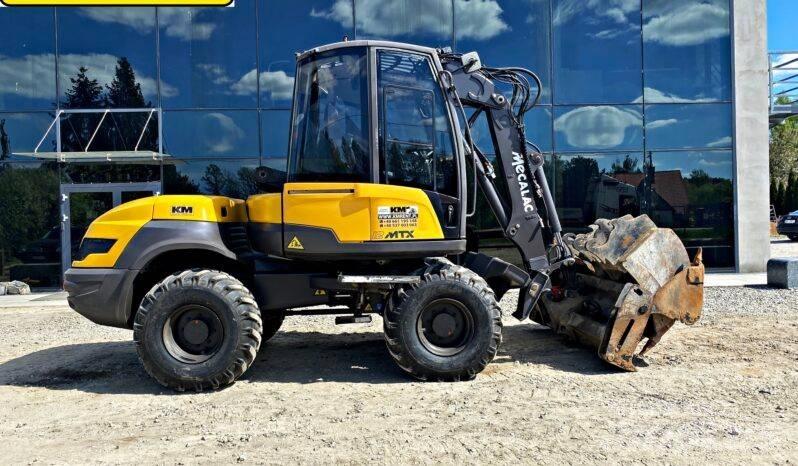 Mecalac 12 M TX Экскаваторы-погрузчики
