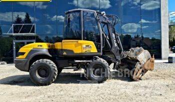 Mecalac 12 M TX Экскаваторы-погрузчики