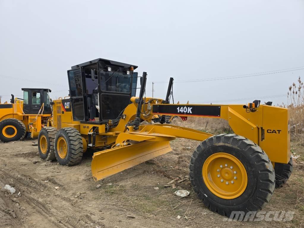 CAT 140K Грейдеры