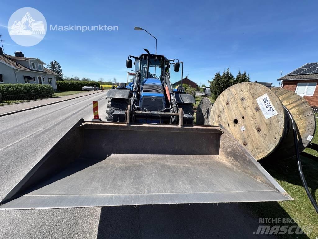 Huddig 1260 C Экскаваторы-погрузчики