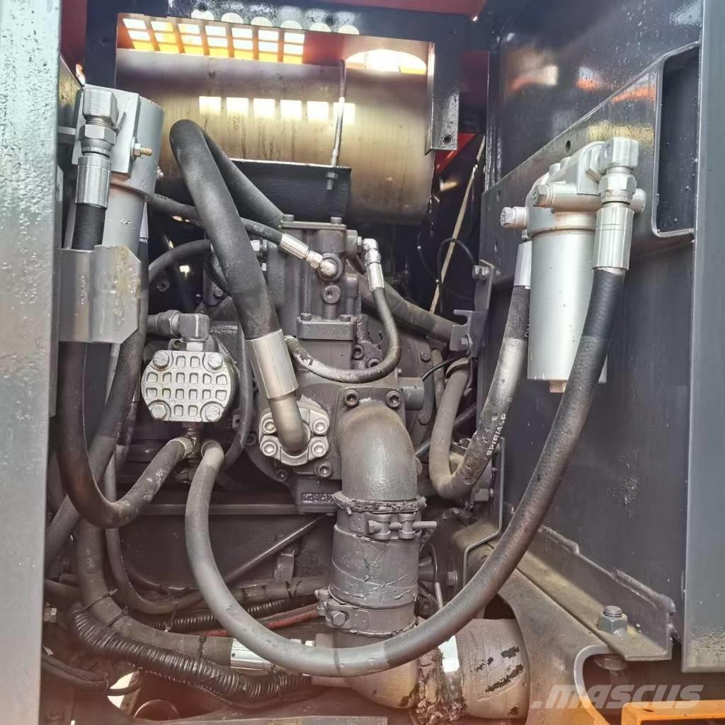 Hitachi EX 100 W D Колёсные экскаваторы