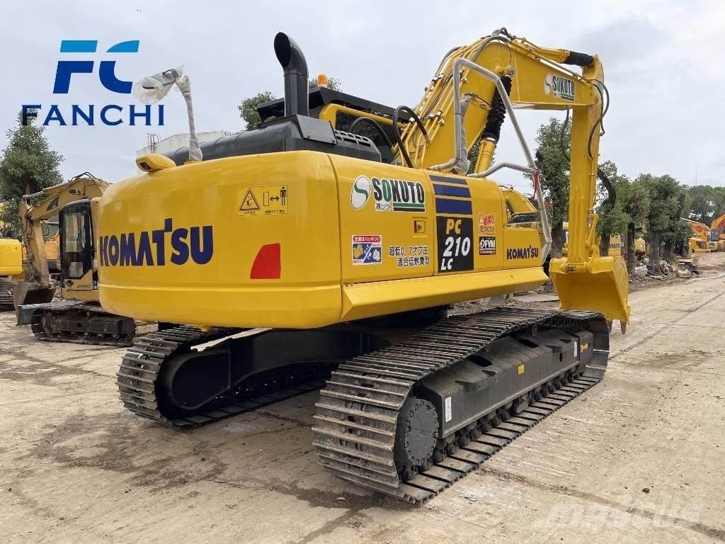 Komatsu PC210 Гусеничные экскаваторы