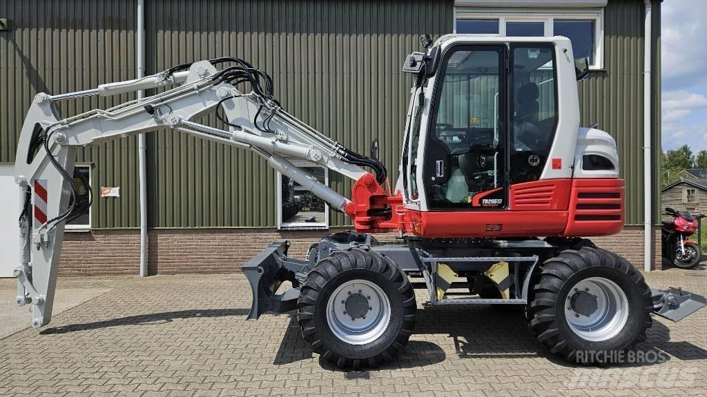 Takeuchi TB295W Колёсные экскаваторы