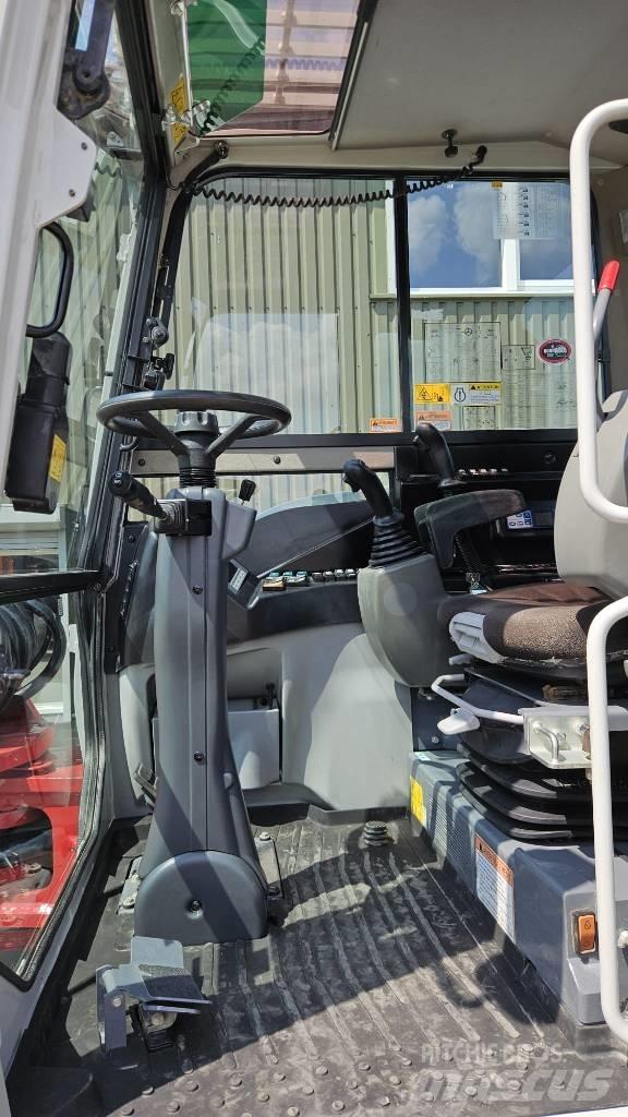 Takeuchi TB295W Колёсные экскаваторы