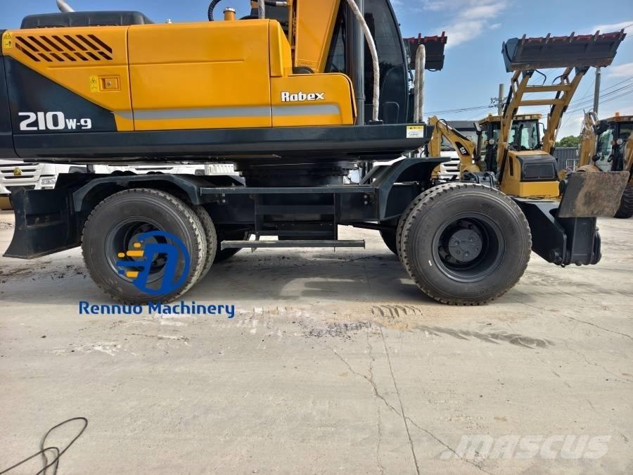 Hyundai 210W-9 Колёсные экскаваторы