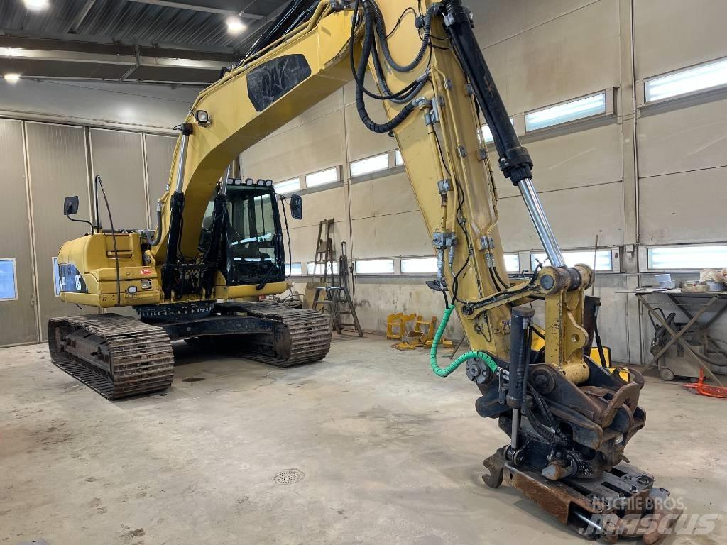 CAT 323 D L Гусеничные экскаваторы