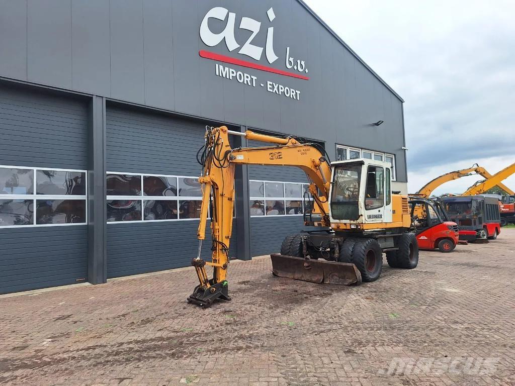 Liebherr A312 Колёсные экскаваторы