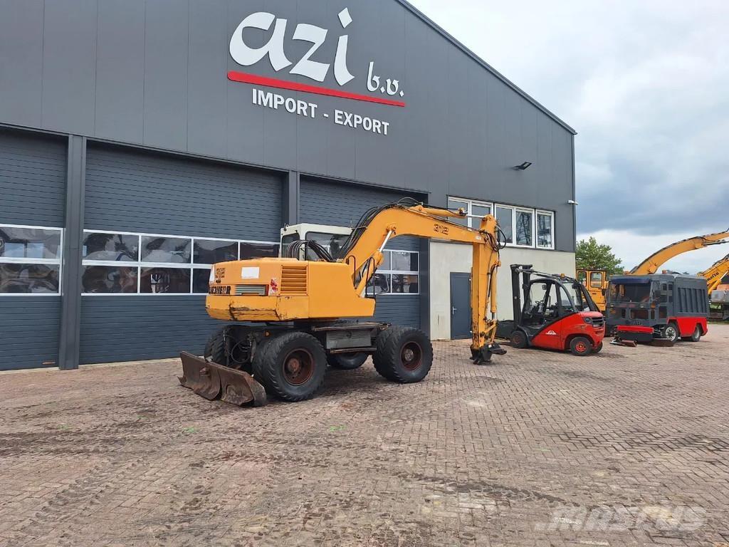 Liebherr A312 Колёсные экскаваторы