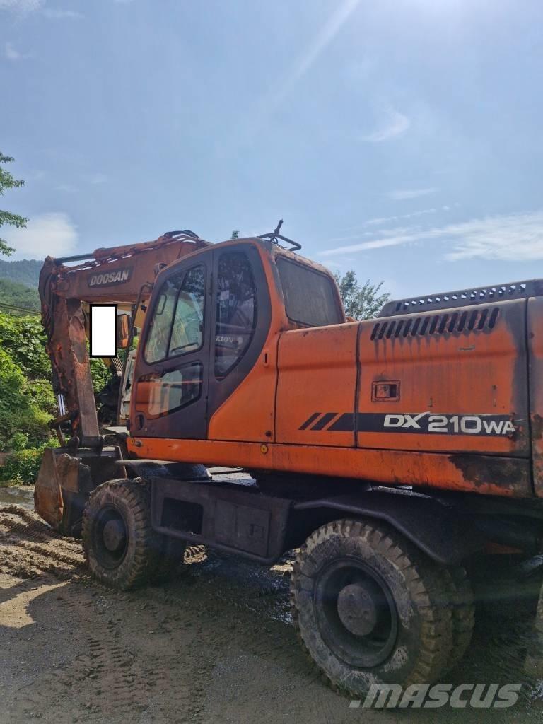 Doosan DX 210 W Колёсные экскаваторы