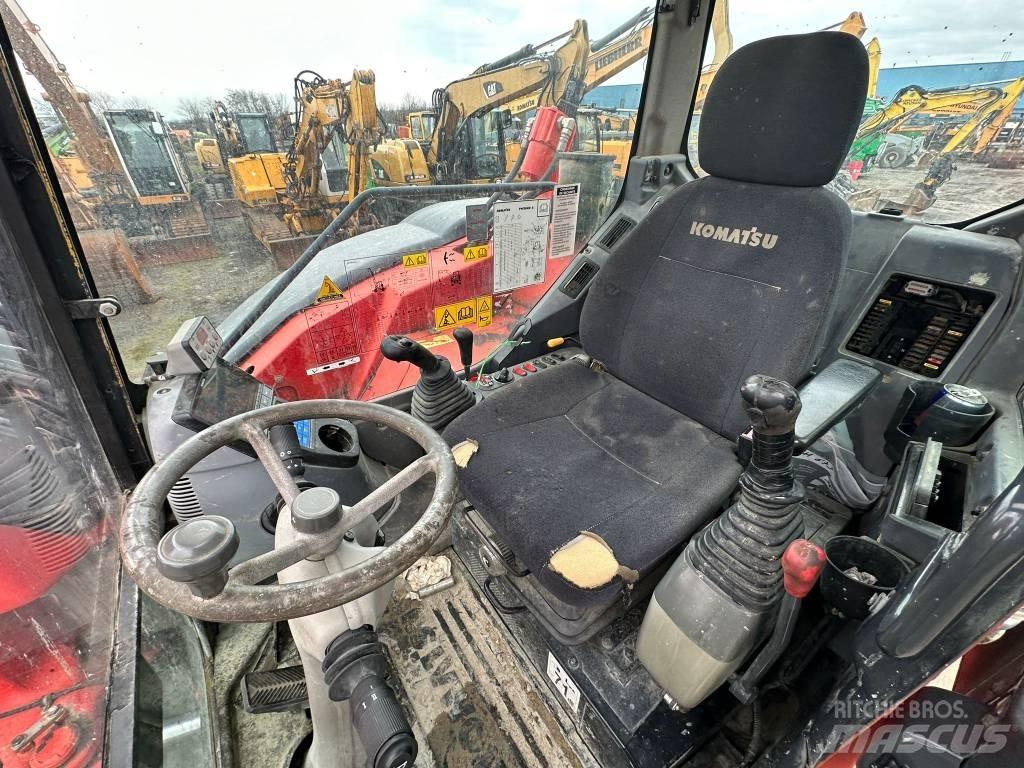 Komatsu PW98MR-8 Колёсные экскаваторы