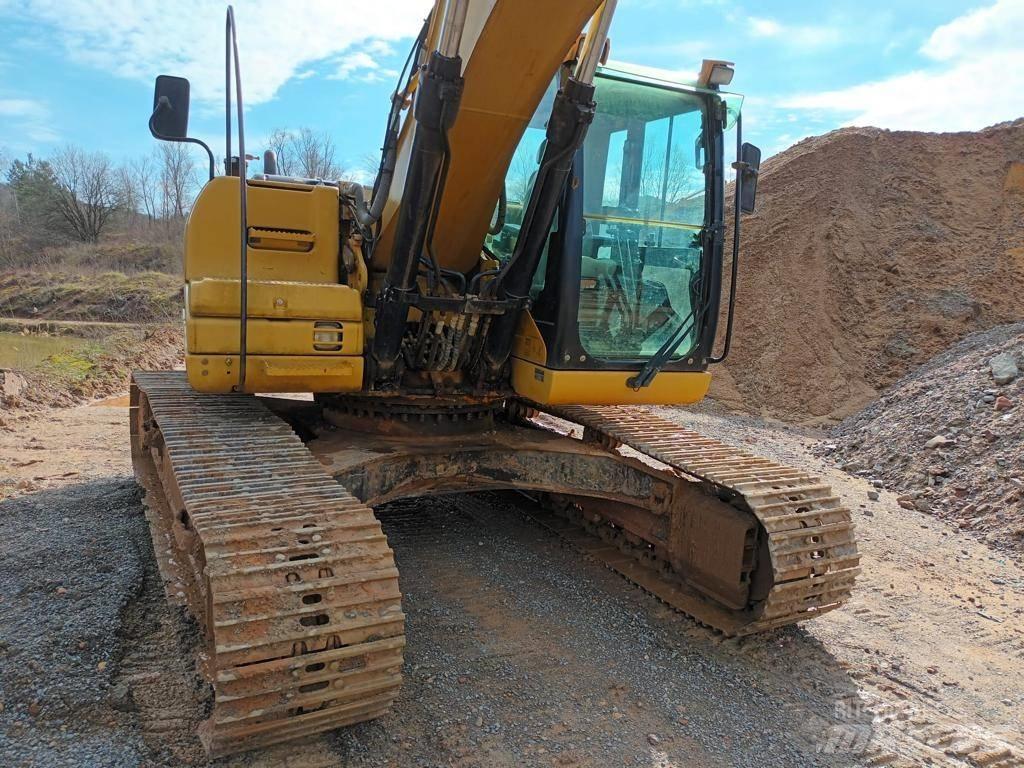 CAT 323 DL Гусеничные экскаваторы