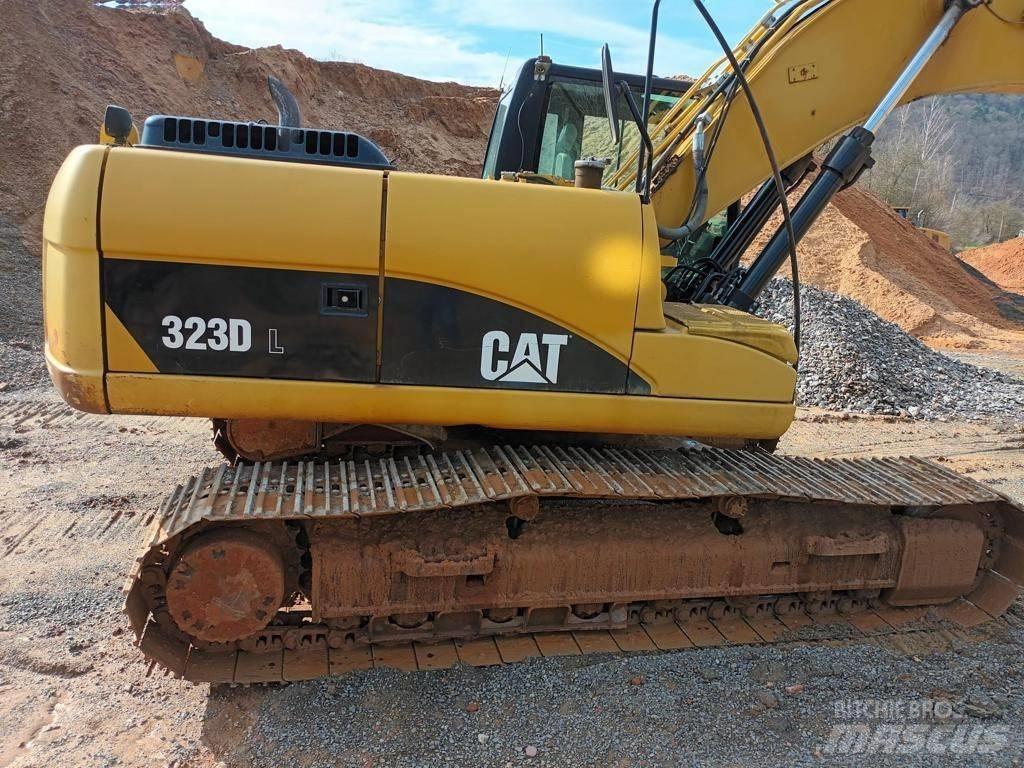 CAT 323 DL Гусеничные экскаваторы