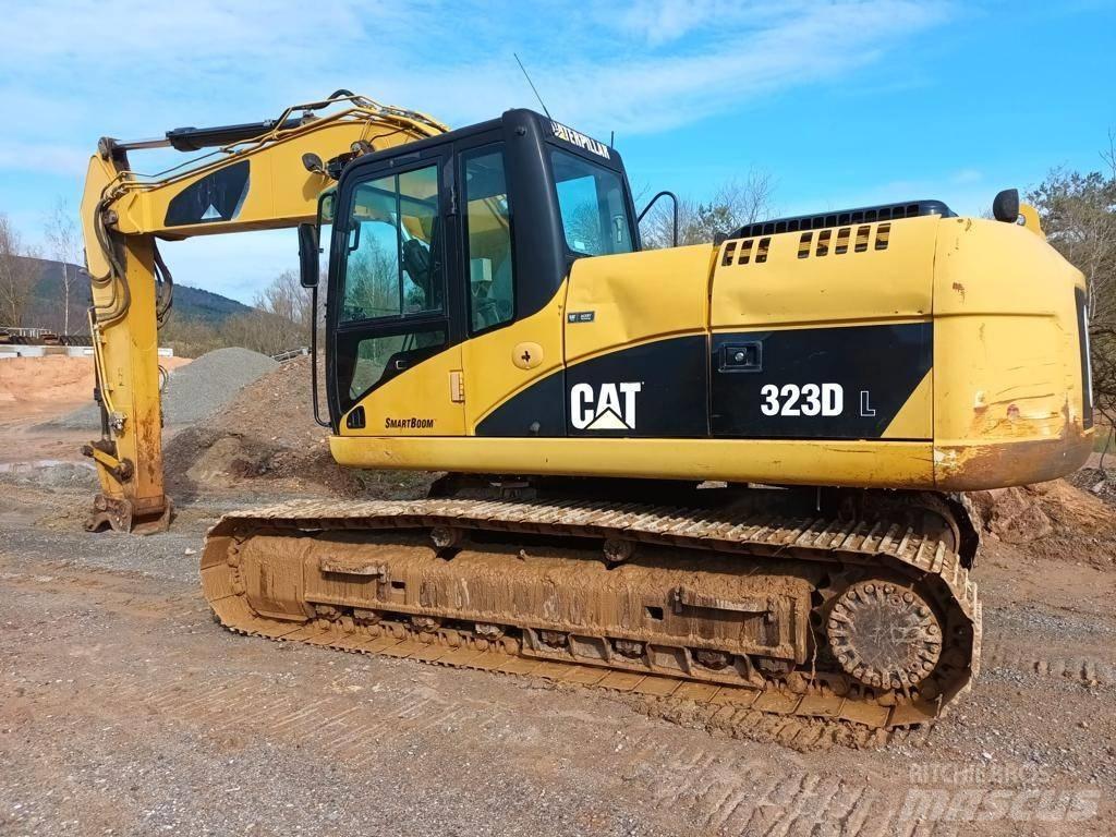 CAT 323 DL Гусеничные экскаваторы