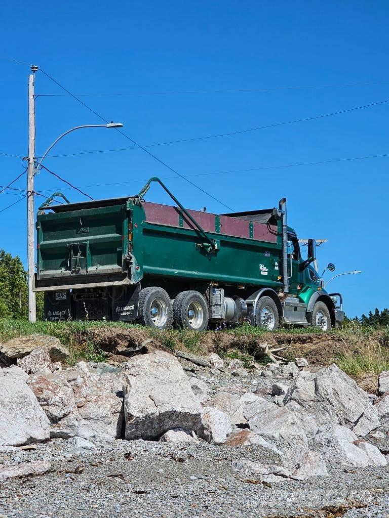 Peterbilt 567 Грузовики-Самосвалы