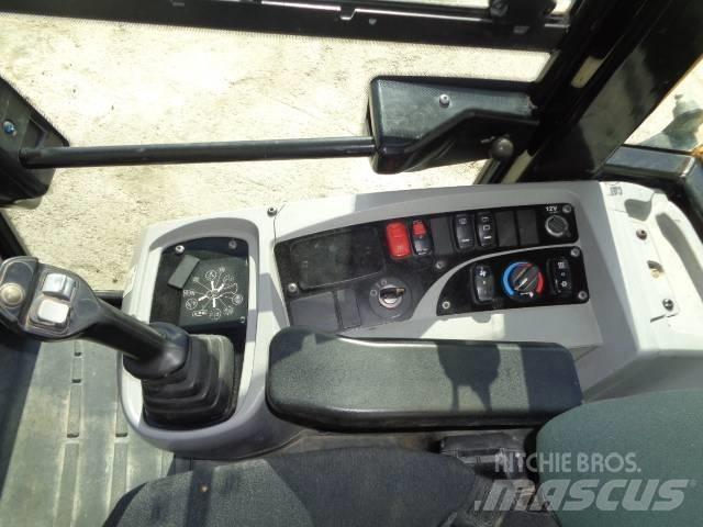 CAT 908M Фронтальные погрузчики