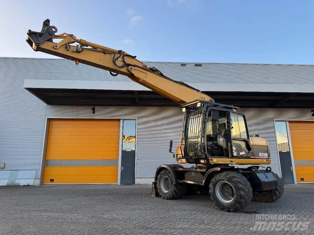 CAT M315C Колёсные экскаваторы