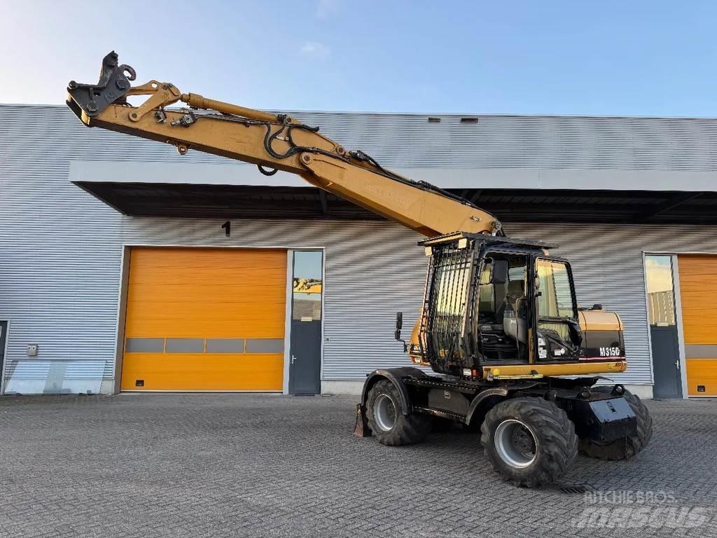 CAT M315C Колёсные экскаваторы