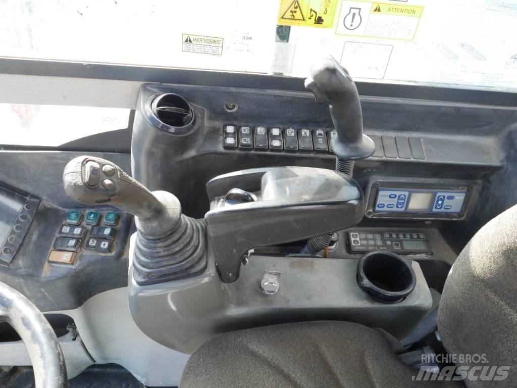 Takeuchi TB 295 W Колёсные экскаваторы