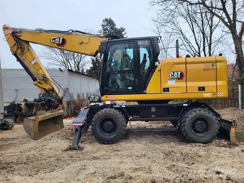 CAT M 318 Строительная техника - Другие