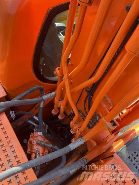 Doosan DX225LC-9C Гусеничные экскаваторы