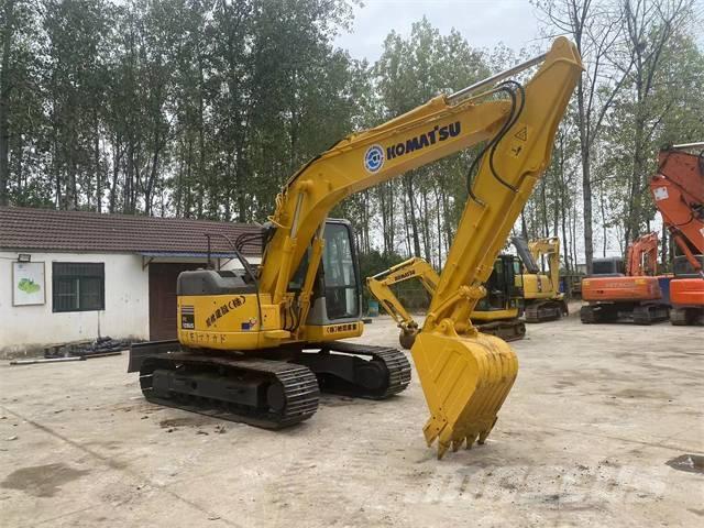 Komatsu PC128US Гусеничные экскаваторы